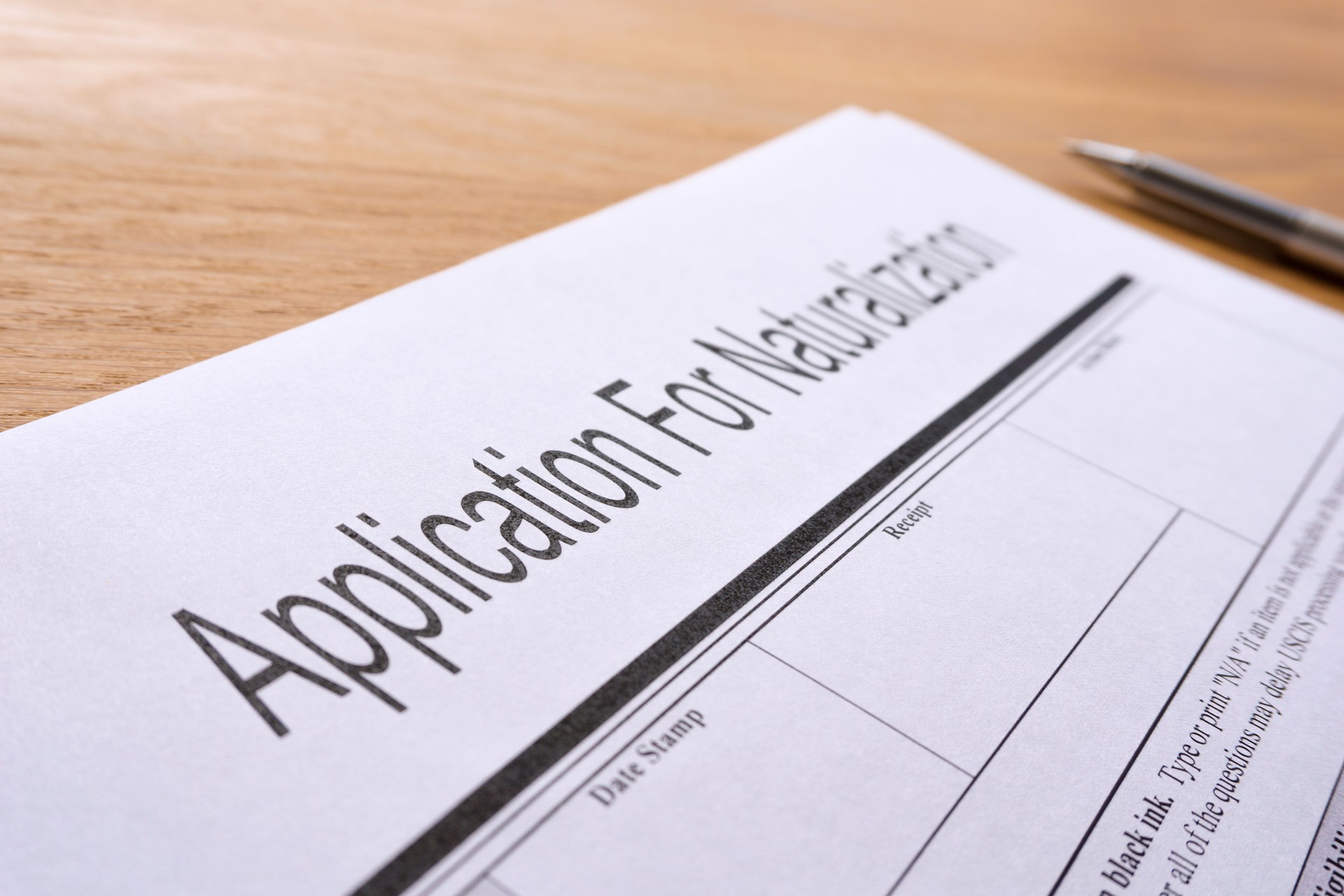 Application for naturalization on table
